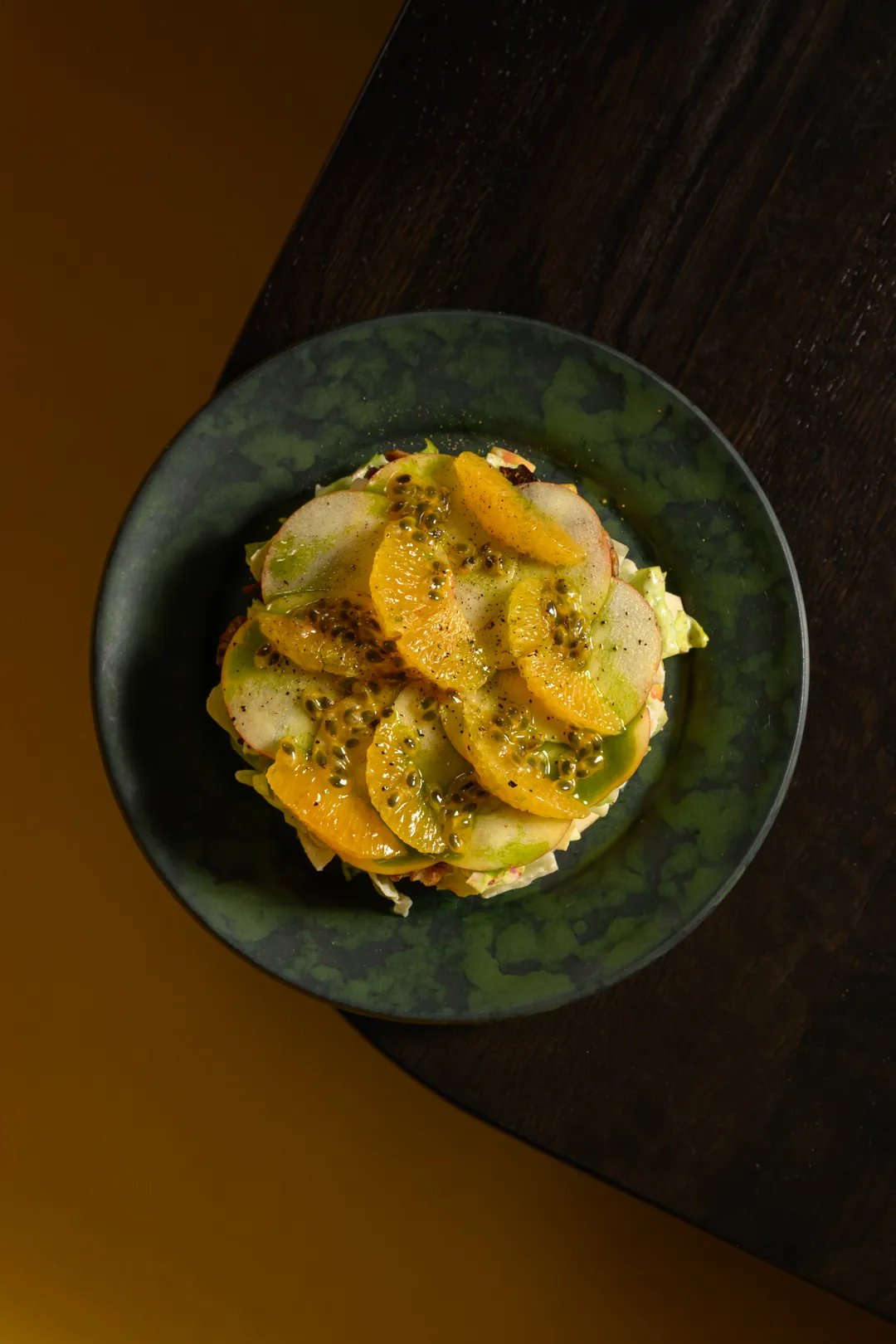 Waldorf salad with apple, orange, and passion fruit